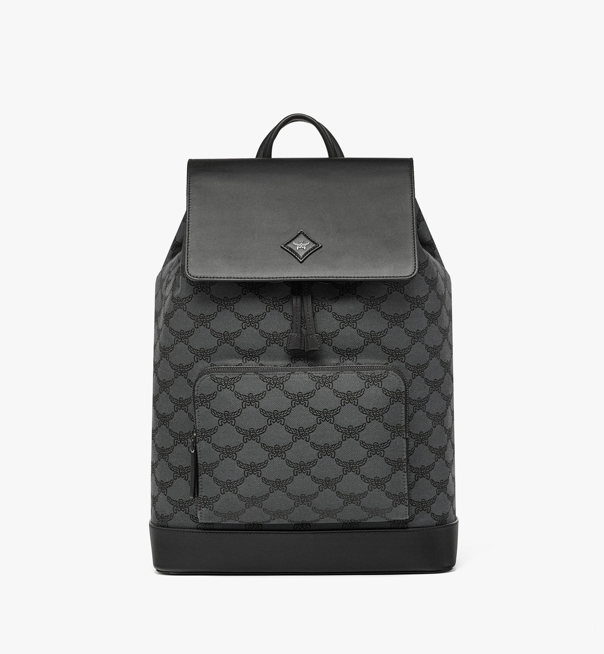 Mcm black and hot sale white backpack